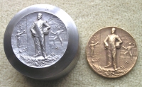Early 20th century steel medal die from a design by Felix Rasumny, with bronze medal